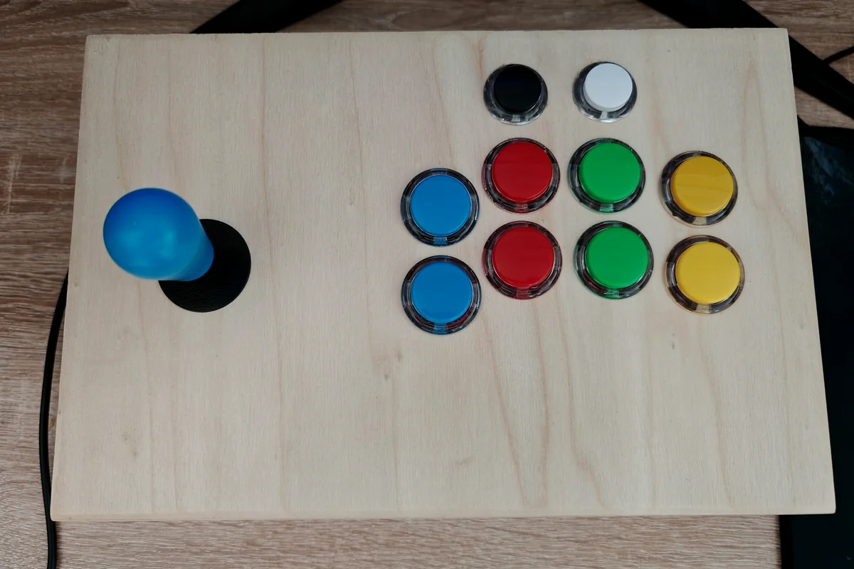 Top view of the arcade joystick and ten-button control layout