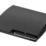 Black Sony PlayStation 3 Slim console viewed from the front at an angle.